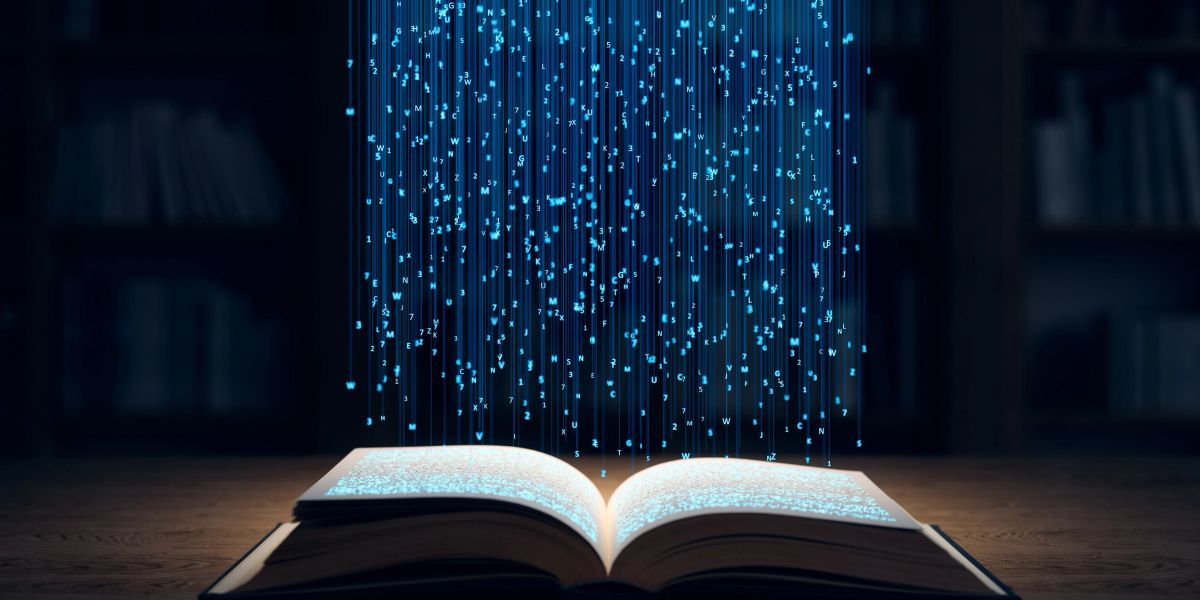 Libro abierto con letras digitales